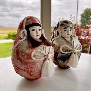 JAPANESE DARUMA DOLLS, ELABORATELY DRESSED IN CLASSIC KIMONO COSTUME.